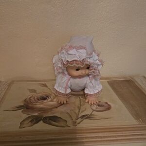 Adorable Baby Doll with Pink and White Outfit